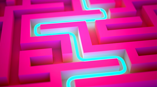 A bright turquoise path illuminated in a bold pink maze just as Bourn Creative guides clients through the branding and creative process
