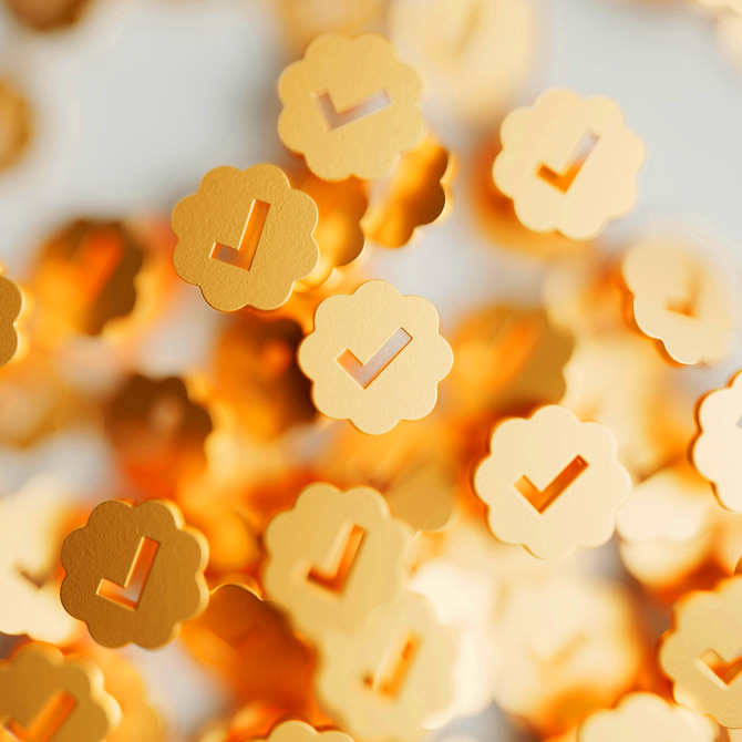 A bunch of bright yellow check mark icons to represent a small, agile, transparent branding agency