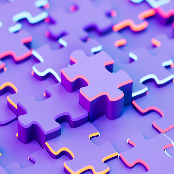 Purple puzzle pieces with different colored borders all locked together like a locked-in SEO and AI visibility focused content strategy